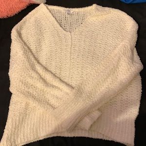 Three Sweaters